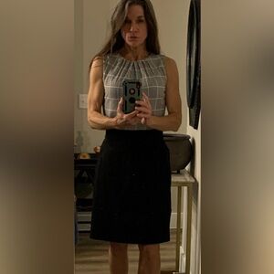 Designer Escadas’ Elegant Black A-line Skirt with pockets.